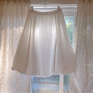 White bubbly skirt.